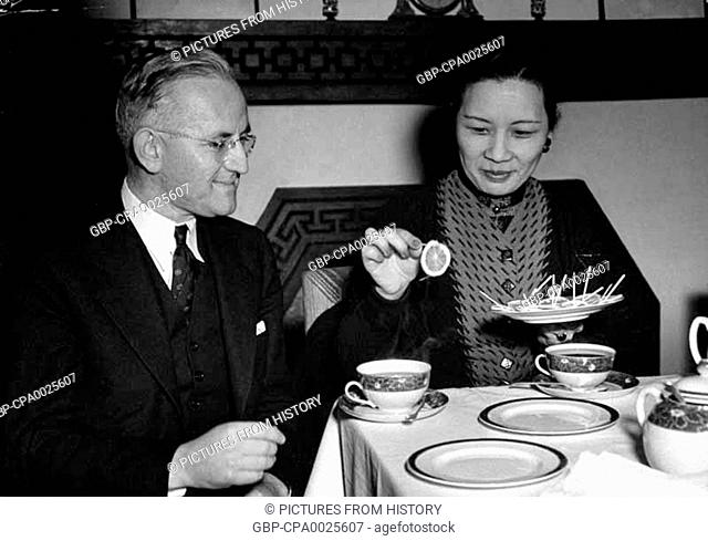 Image result for Lauchlin Currie, a White House advisor to FDR, at tea with Soong Mei-ling (Madame Chiang) in China in early 1941.